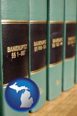 michigan map icon and bankruptcy law books