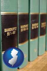 new-jersey map icon and bankruptcy law books